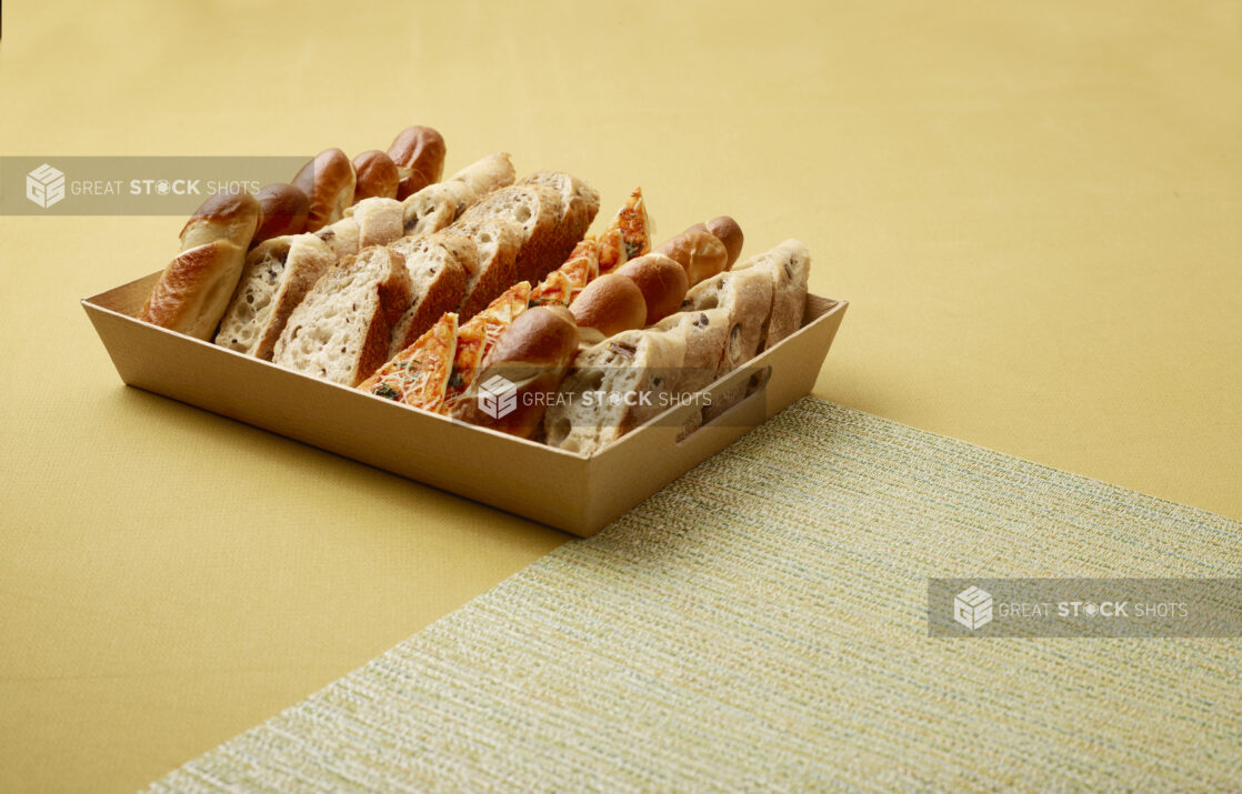 assorted bread basket in a catering tray