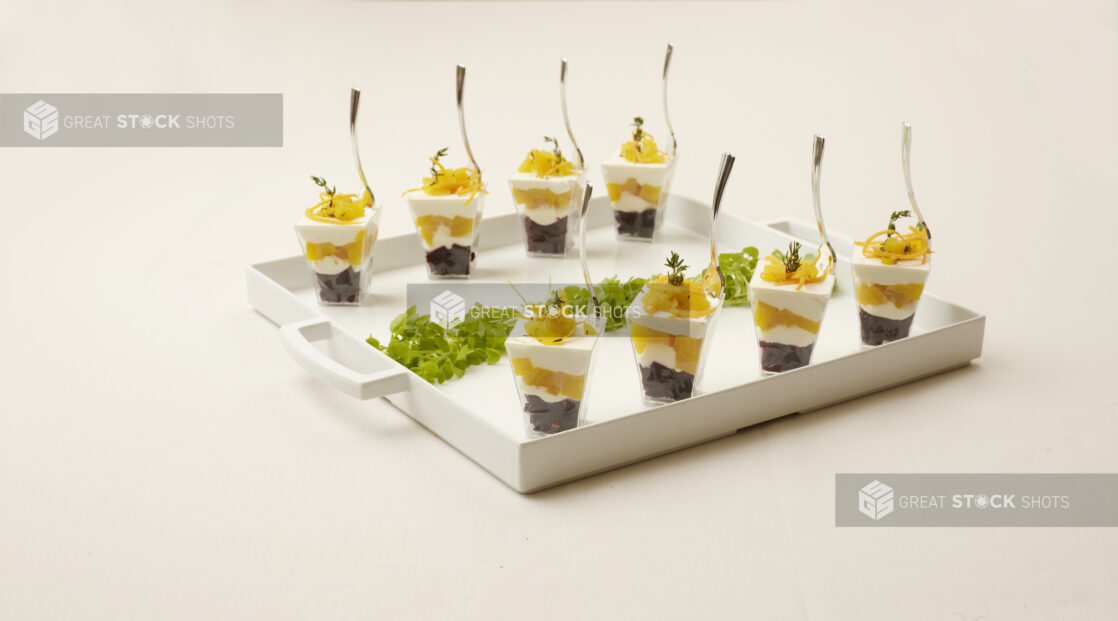 platter of individual mango dessert cups