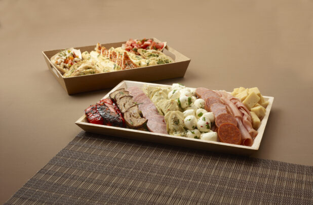 mixed antipasto platter with a side gourmet bread basket