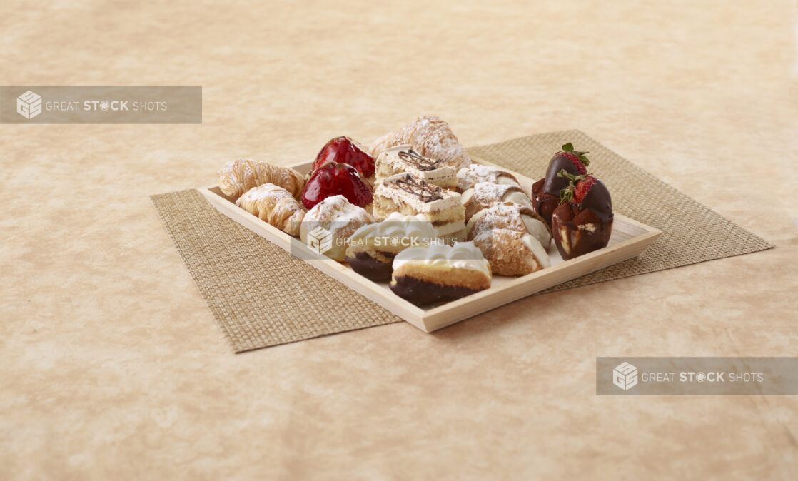 Italian dessert platter on a wood catering tray