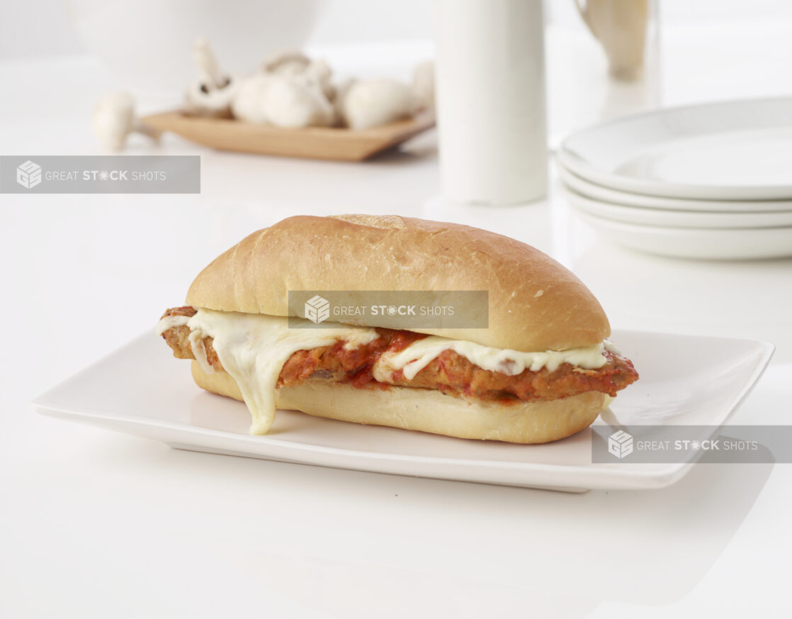 chicken parmesan sandwich on a white roll