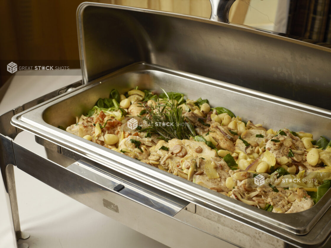 Stainless Steel Chafing Tray with a Portobello Mushroom, Spinach, Chicken and Gnocchi Entrée for Banquets, Buffets and Full Service Catering