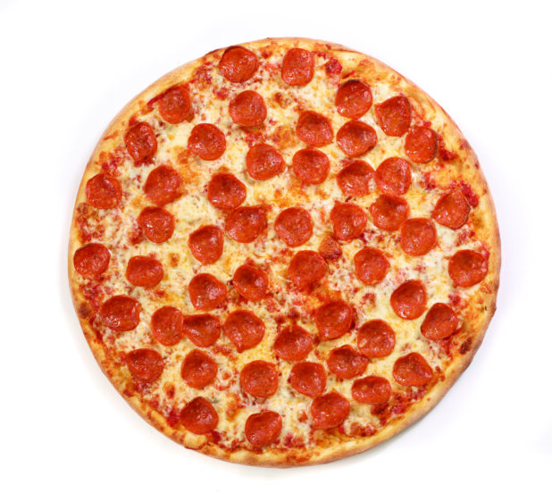 Overhead View of a Whole Pepperoni Pizza on White for Isolation