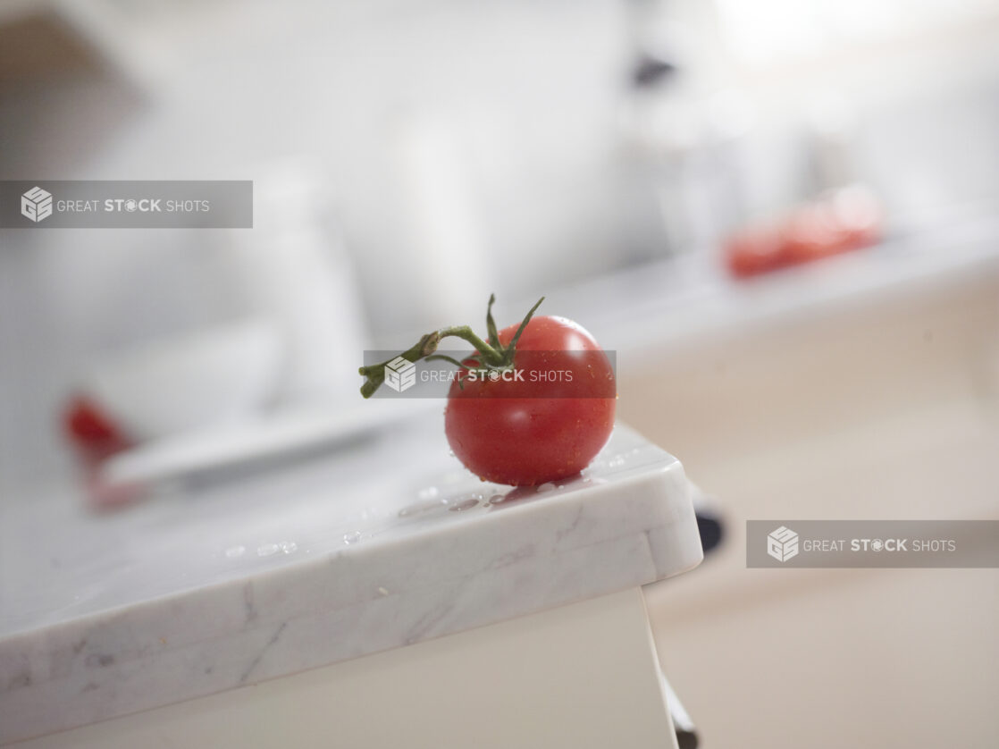 Tomato on Vine on Marble Counter with Bokeh Background - Variation