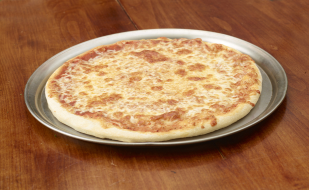 Whole unsliced cheese pizza on a steel platter