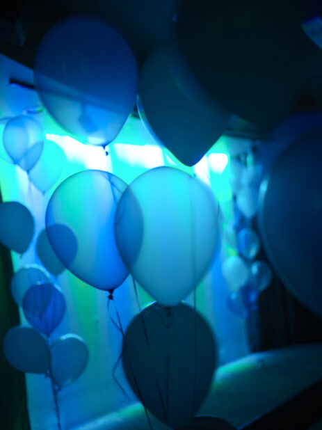 multiple groups of helium balloons