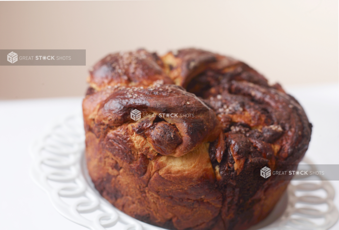 crispy bunt shaped monkey bread close up on a cake stand