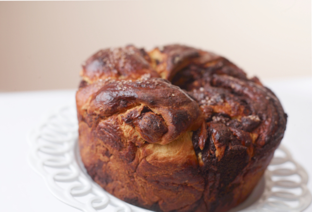 crispy bunt shaped monkey bread close up on a cake stand