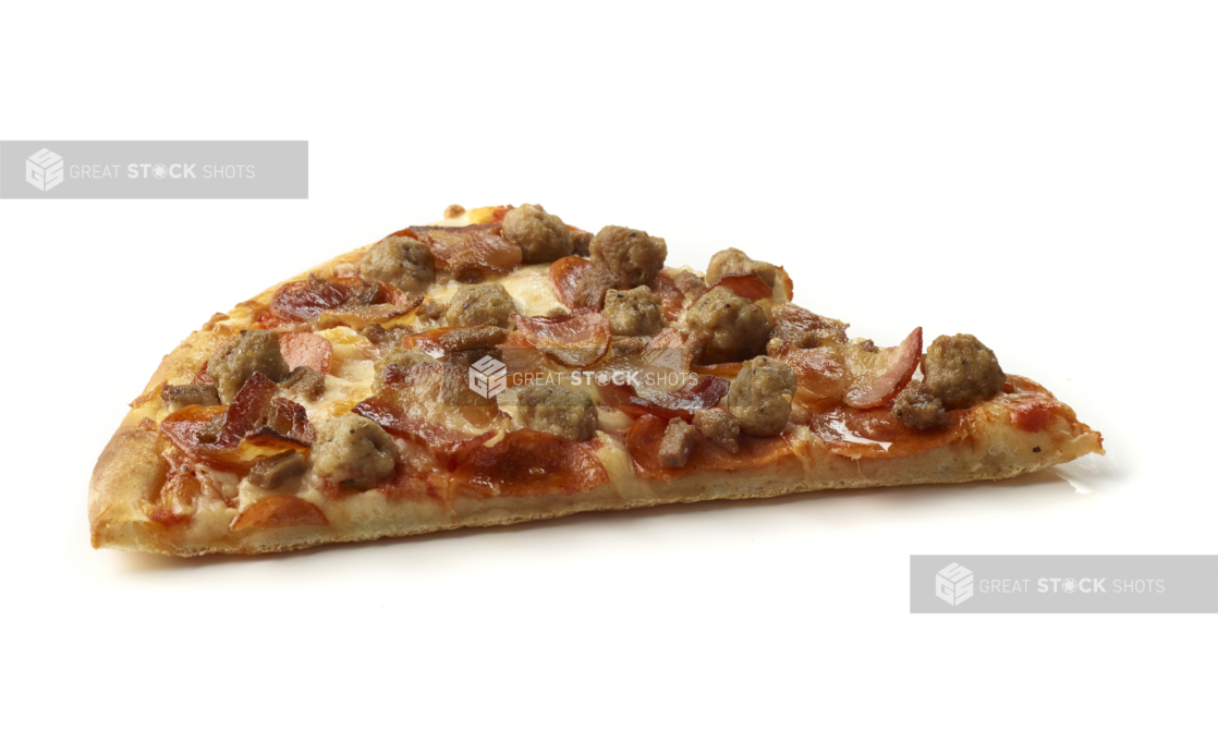 Side View of a Jumbo Meat Lover's Pizza Slice with Pepperoni, Bacon and Italian Sausage Shot on White for Isolation