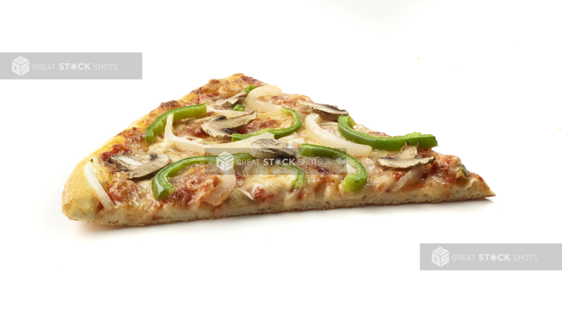 Side View of a Jumbo Vegetarian Pizza Slice with Green Peppers, White Onions and Mushrooms Shot on White for Isolation