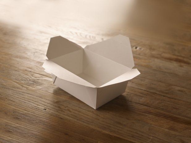White Cardboard Take-Out Container, Open on a Rustic Wooden Surface in an Indoor Setting