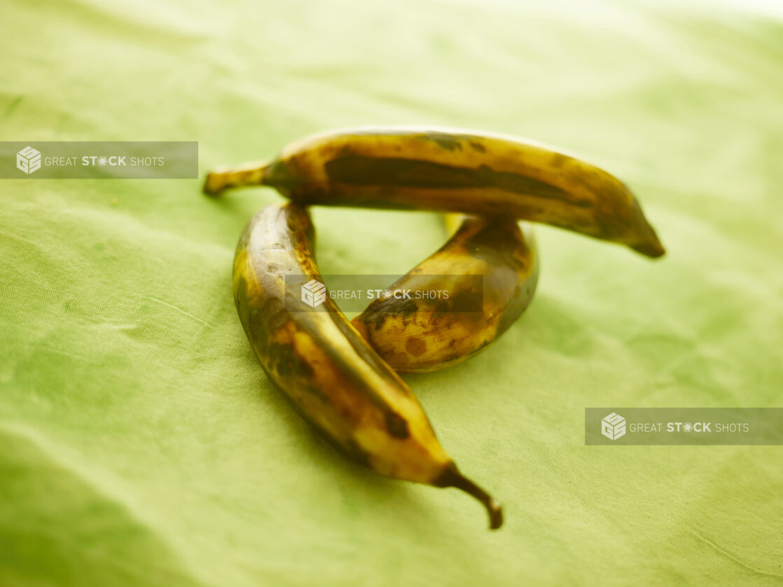 Roasted plantain on a lemon/lime green tablecloth