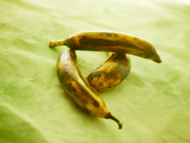 Roasted plantain on a lemon/lime green tablecloth