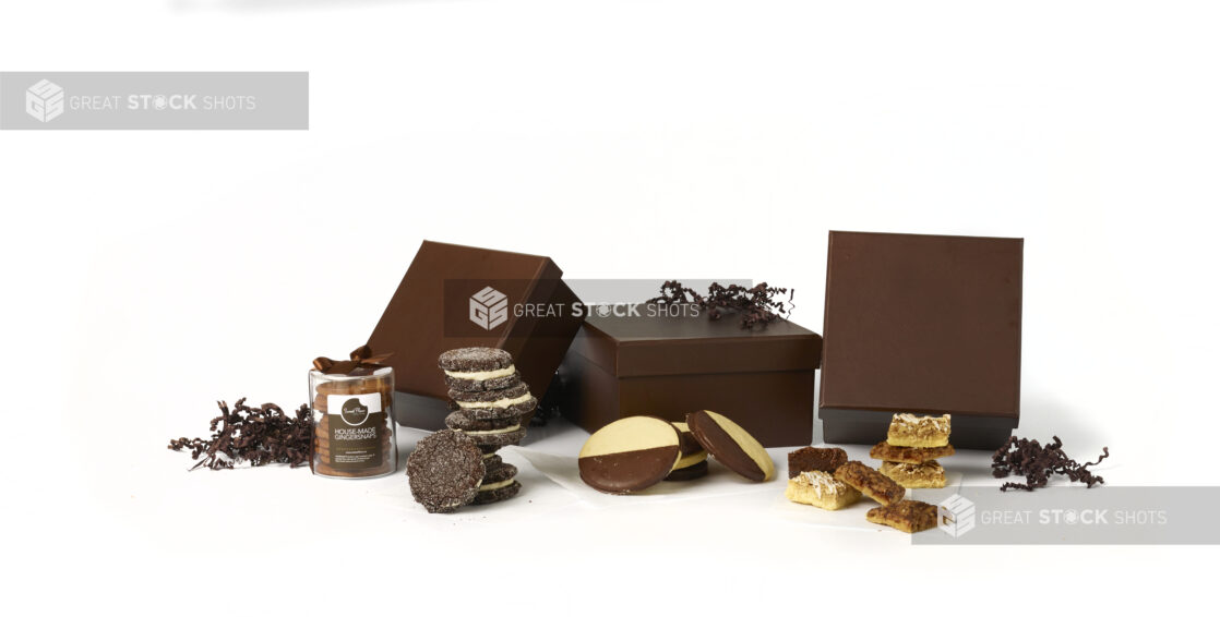 A Gift Box Set of Gourmet Desserts and Baked Goods Shot on White for Isolation