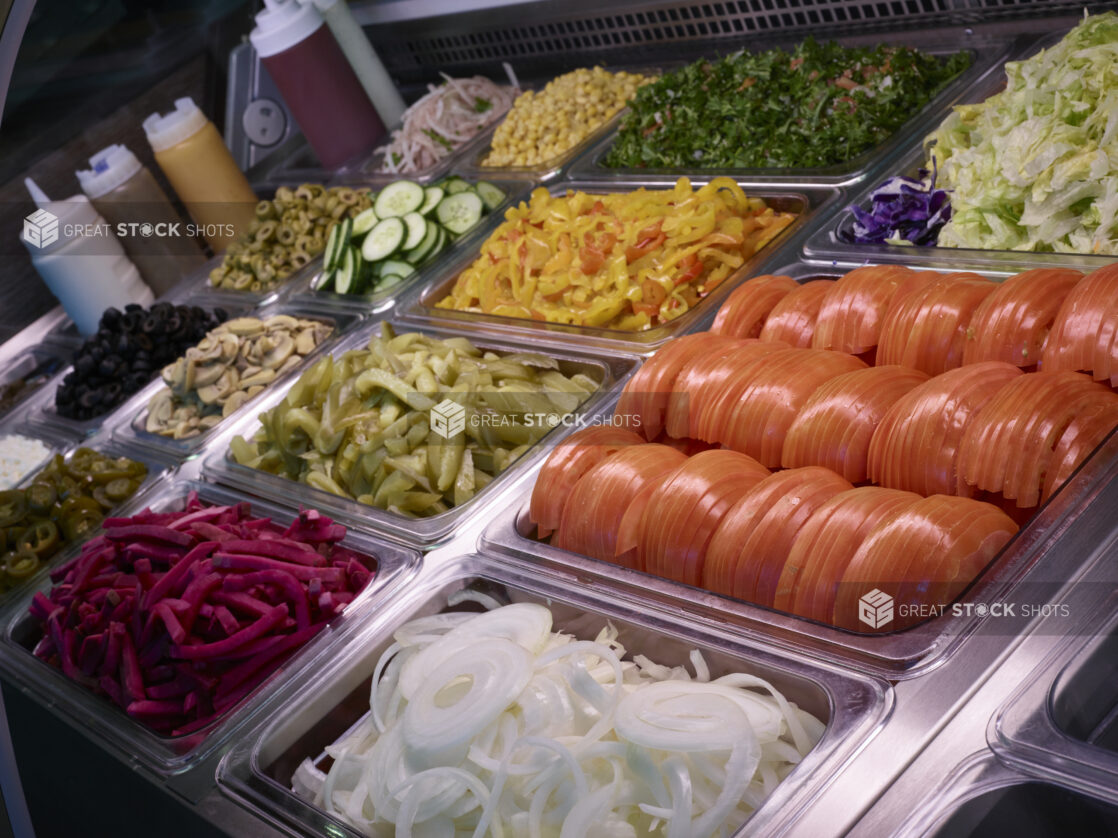 Topping and condiment table in middle eastern restaurant