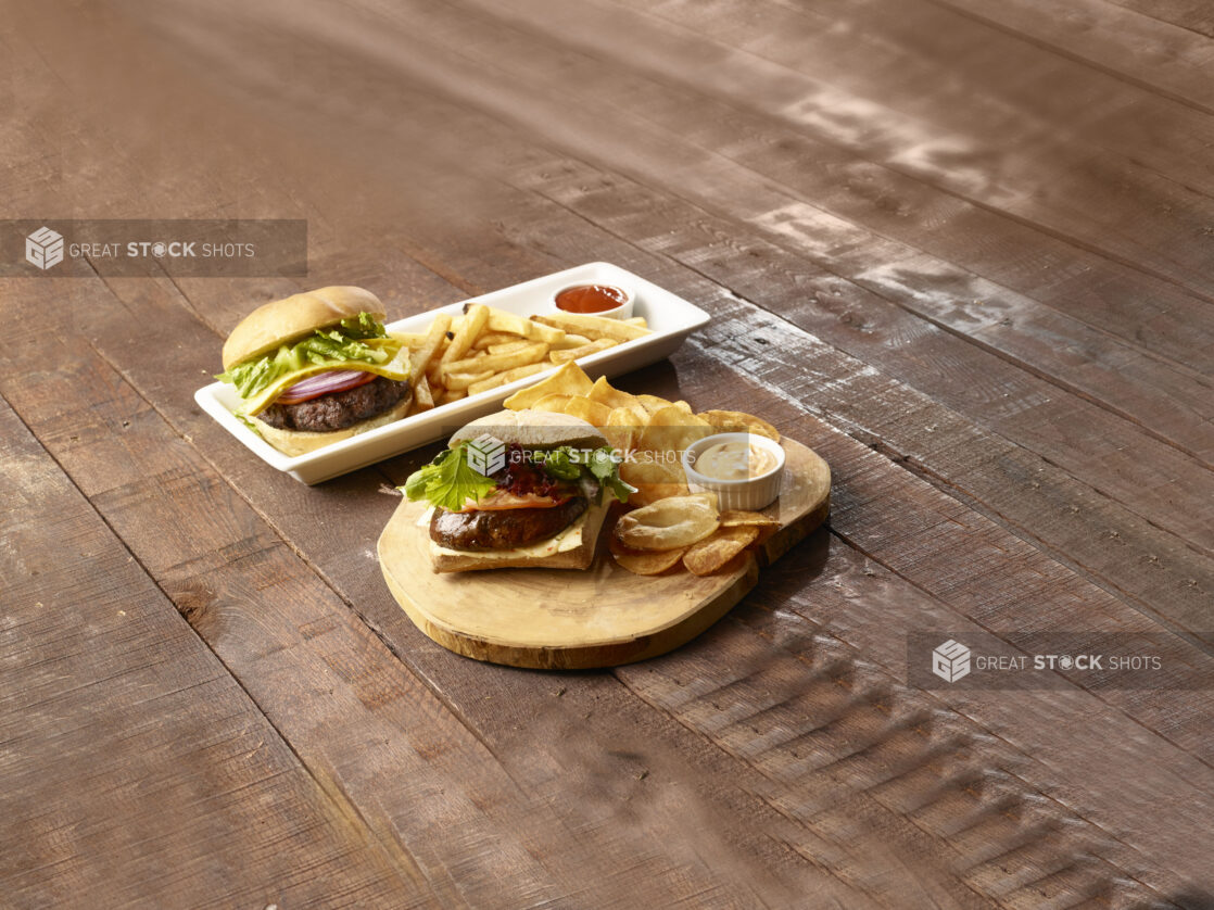 Hamburger and sandwich combos on a dark wooden background