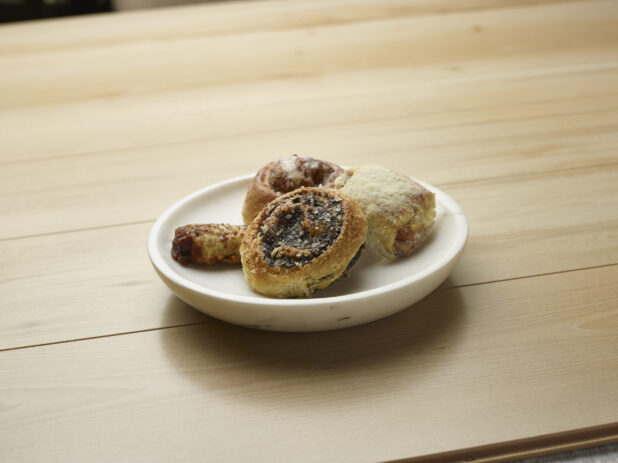 Assortment of pastries on a wooden background