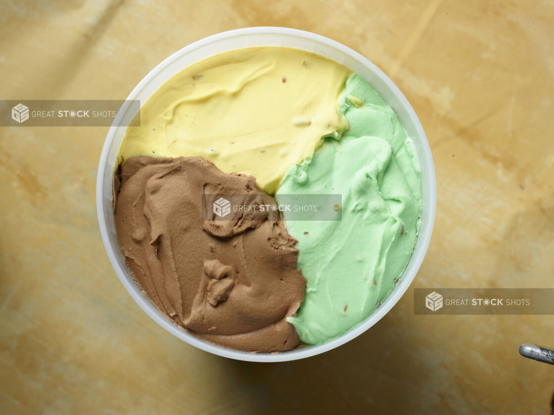 Three flavors of ice cream in a bucket overhead