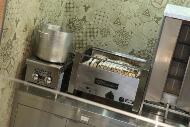 Restaurant equipment vertical broiler, single pot stove, indoor BBQ all on a counter,
