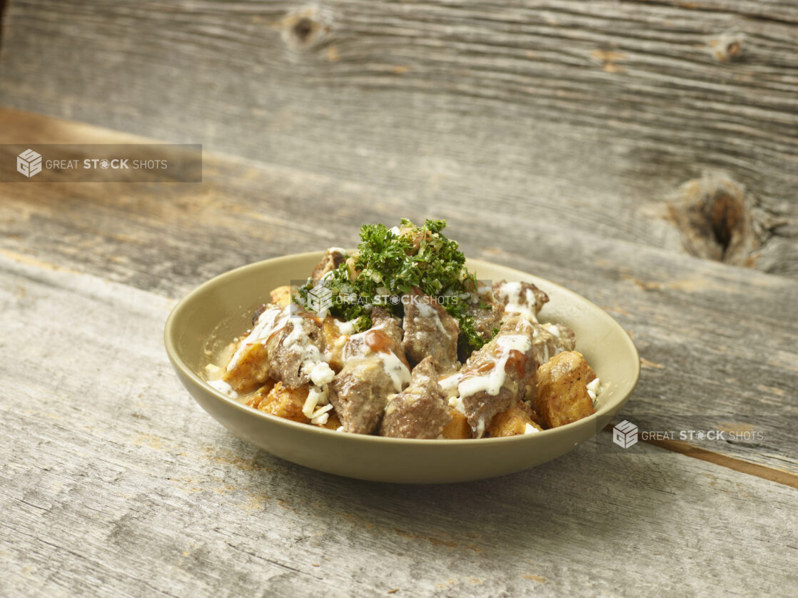 Chicken Shawarma potato bowl on a wooden background