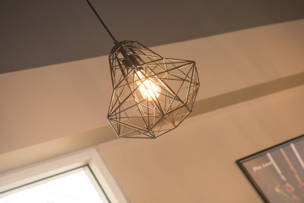 Decorative indoor light fixture from underneath on a bias