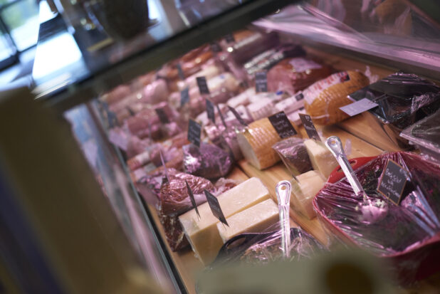 Inside View of a Cheese, Deli Meat and Prepared Salads Counter in a Gourmet Grocery Store