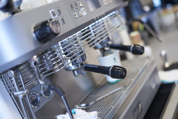 Close Up of a Commercial Espresso Coffee Machine in an Indoor Café Setting