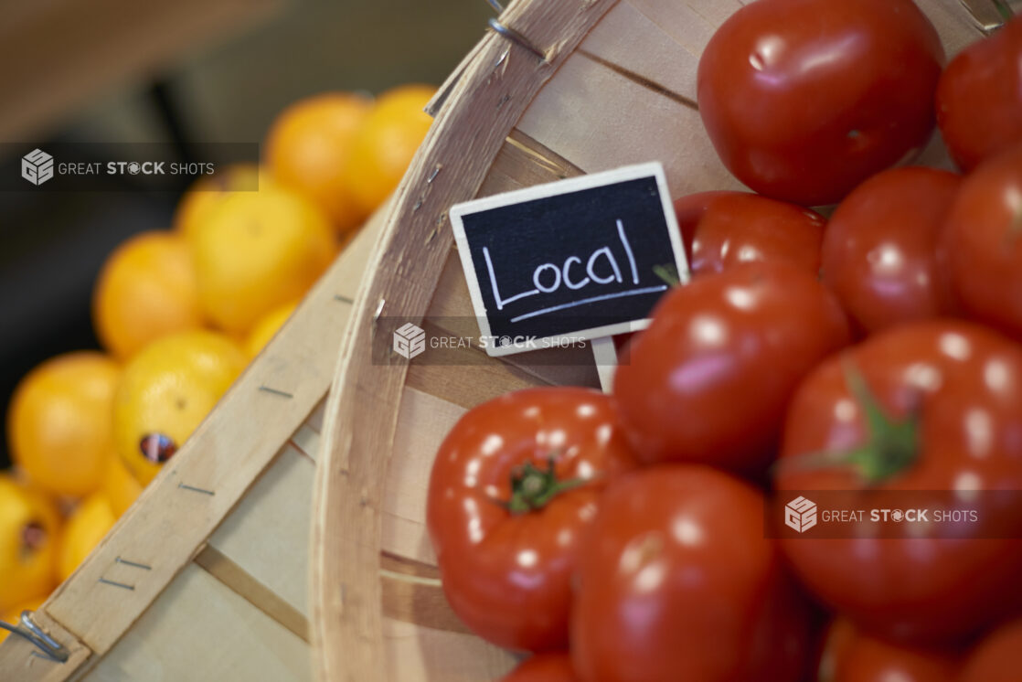 Vine tomatoes in a bushel basket