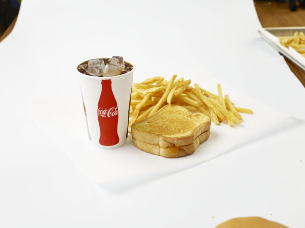 Grilled Cheese Sandwich Combo with French Fries and a Fountain Soda in a Paper Cup with Ice Cubes, on a White Background for Isolation
