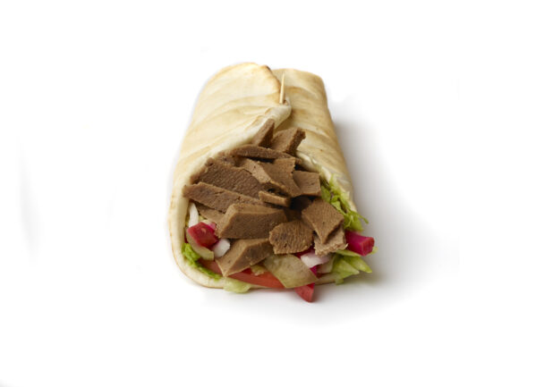 Gyro Pita Wrap with Fresh Vegetable Toppings, Shot on White for Isolation