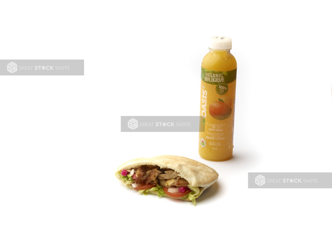 Combo Meal with a Bottle of Orange Juice and a Chicken Shawarma Pita Pocket Kids Meal, on a White Background for Isolation