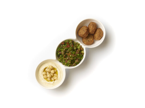 Overhead View of a Trio Plate of Side Dishes: Falafel Balls, Tabbouleh and Hummus, on a White Background for Isolation