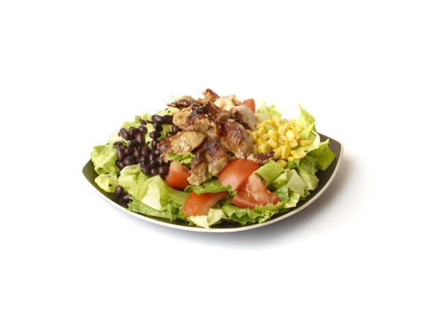 Chicken Shawarma Salad with Corn and Black Beans on a Square Black Ceramic Dish, on a White Background for Isolation - Variation