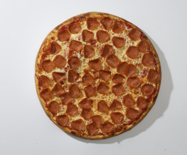 Overhead View of a Whole Pizza with Pepperoni and Cheese Toppings, on a White Background for Isolation