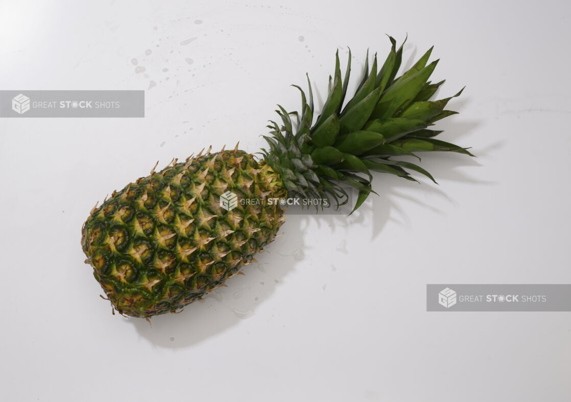 Overhead View of a Whole Pineapple, on a White Background for Isolation