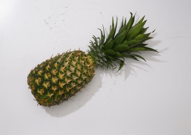 Overhead View of a Whole Pineapple, on a White Background for Isolation