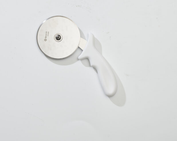 Overhead View of a Pizza Cutter with a White Handle, on a White Background for Isolation - Variation