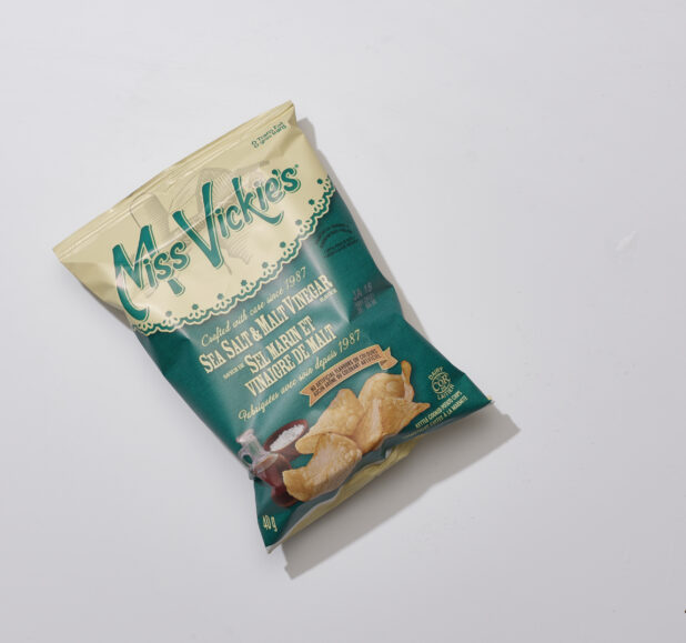 Overhead View of a Small Bag of Miss Vickie's Sea Salt and Malt Vinegar Potato Chips, on a White Background for Isolation