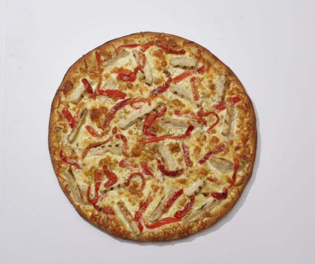 Overhead View of a Whole Specialty Pizza with Roasted Red Pepper, Grilled Chicken and Parmigiano Cheese, on a White Background for Isolation