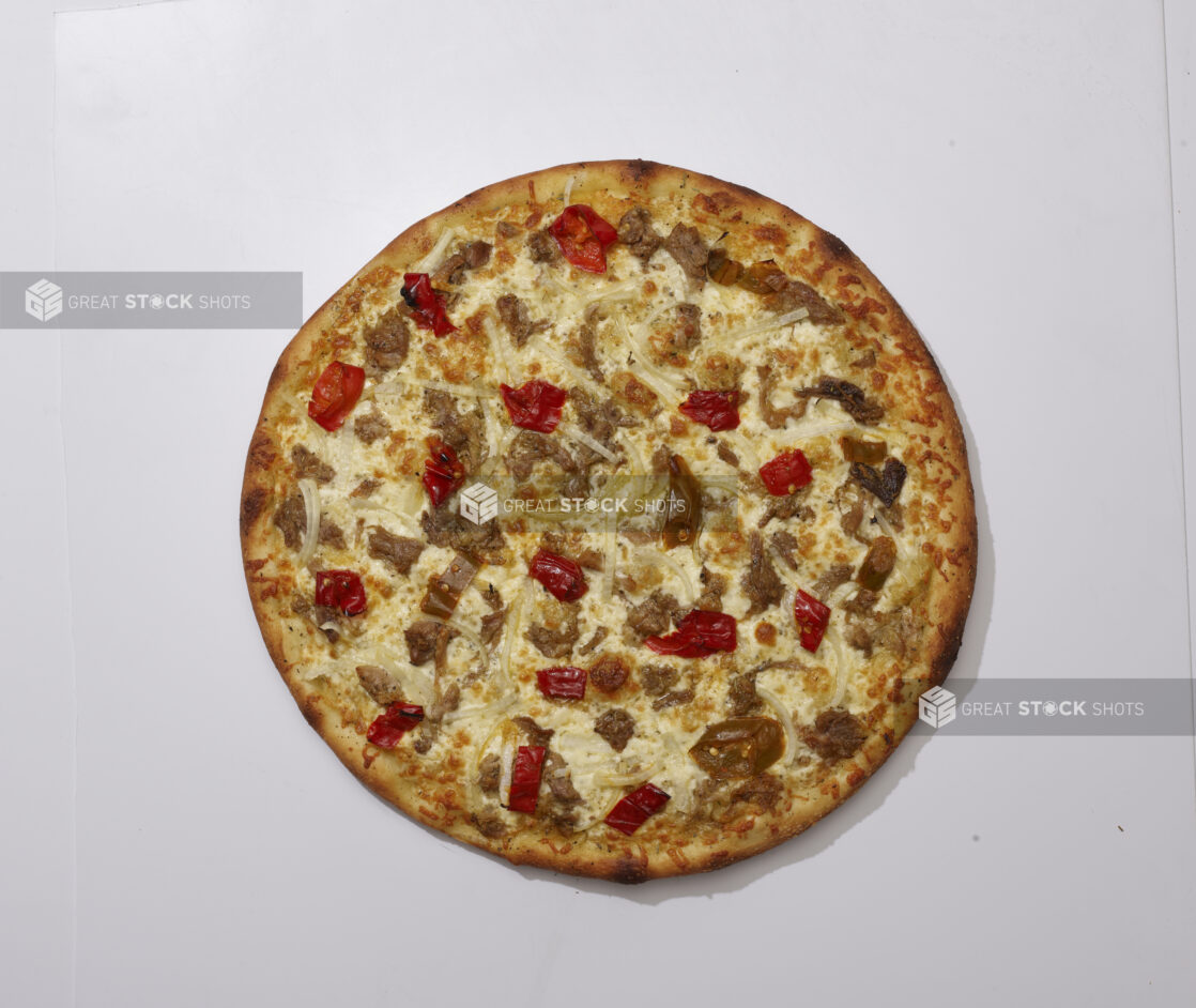 Overhead View of a Whole Specialty Pizza with Porchetta, Hot Peppers and White Onions Toppings, on a White Background for Isolation