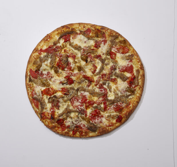 Overhead View of a Whole Specialty Pizza with Porchetta and Hot Banana Peppers Toppings with Cheese on Top, on a White Background for Isolation