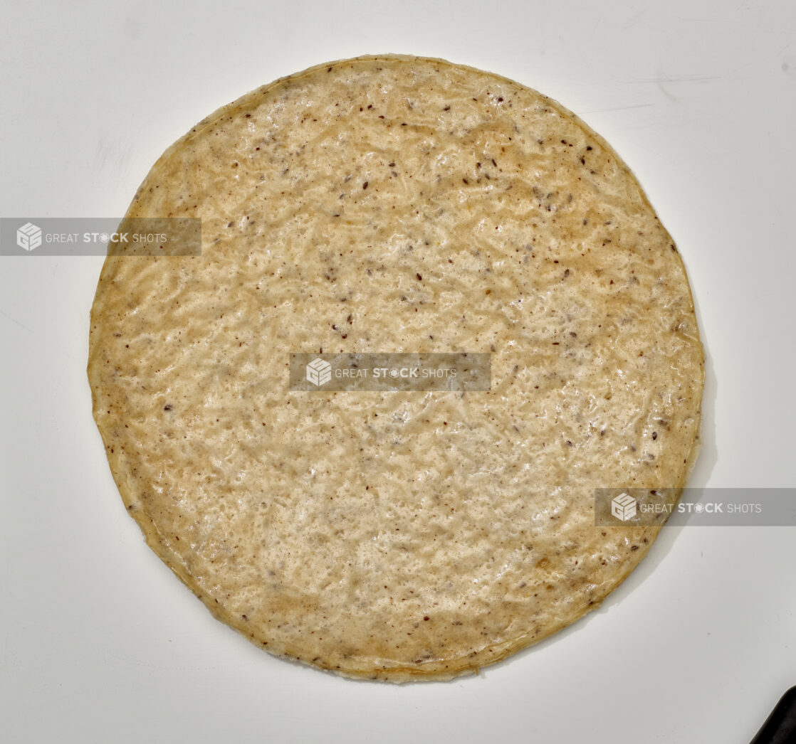 Overhead View of a Gluten-Free Pizza Crust, on a White Background for Isolation