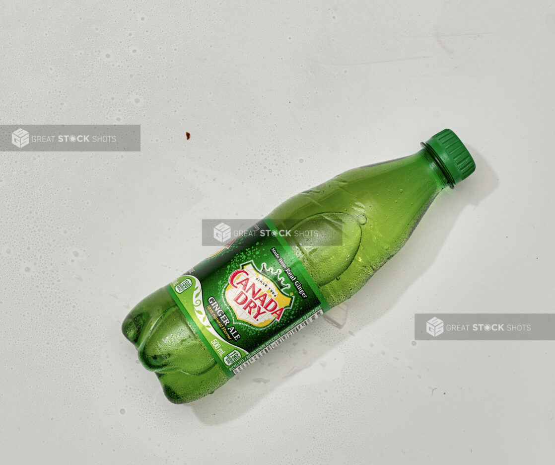 Overhead View of Canada Dry Ginger Ale in a Plastic Bottle, on a White Background for Isolation