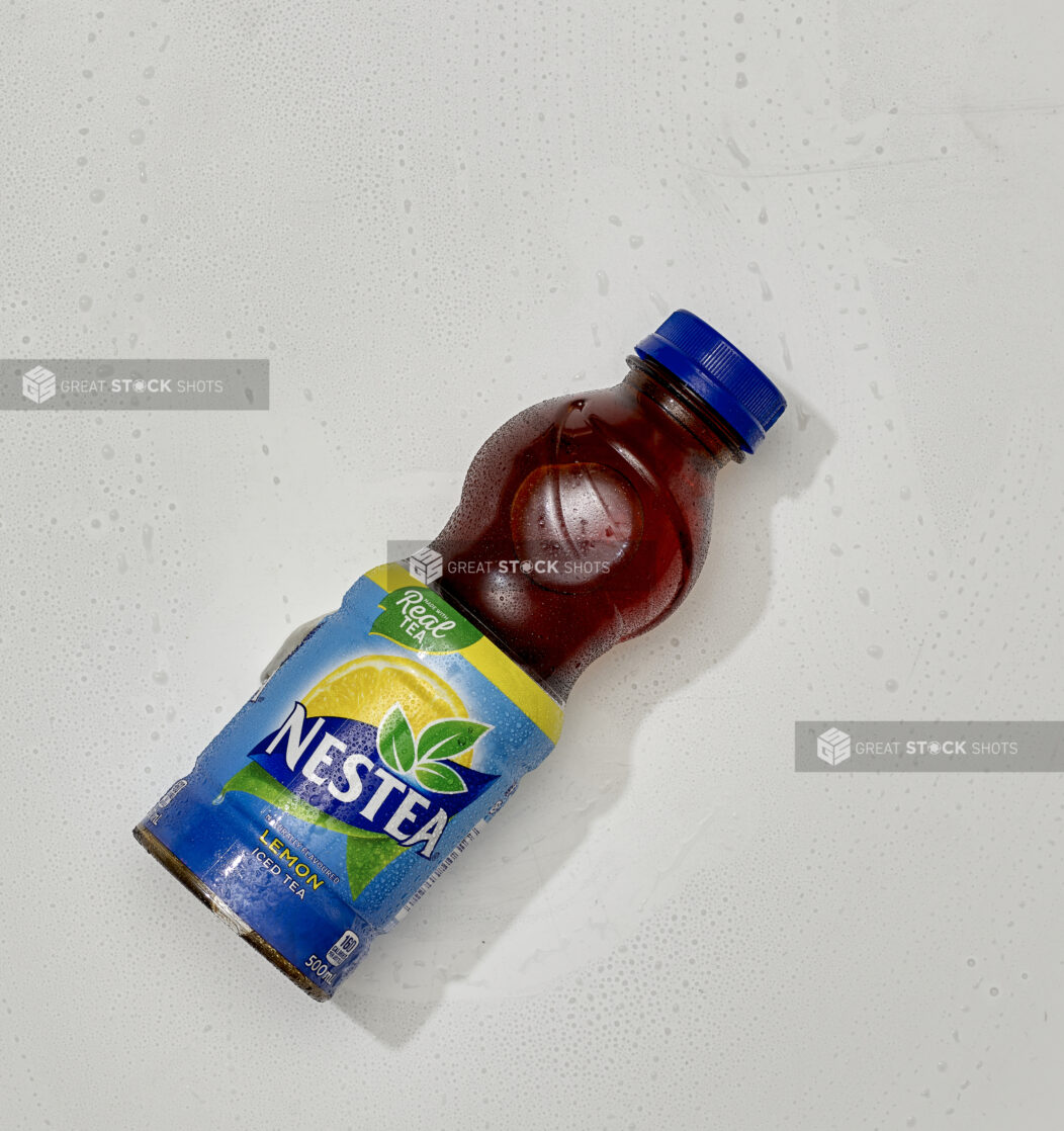 Overhead View of Nestea Lemon Iced Tea in a Plastic Bottle, on a White Background for Isolation