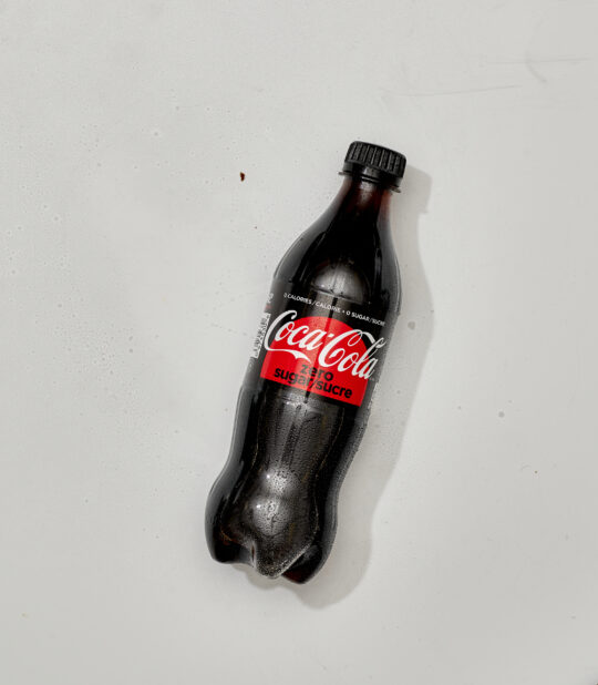 Overhead View of Coke Zero in a Plastic Bottle, on a White Background for Isolation
