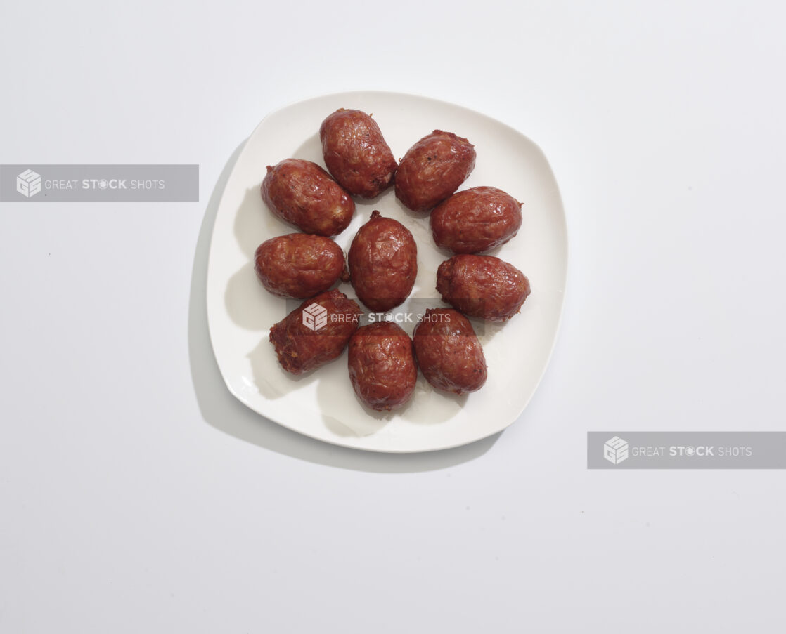 A plate of Meatballs on a white background