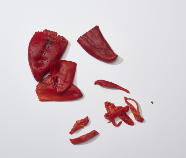 Roasted red peppers on a white background