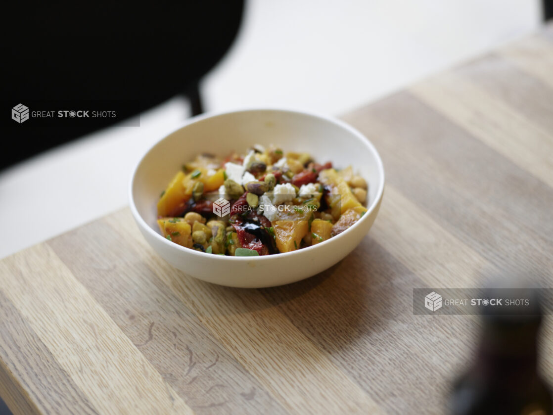 A Mediterranean roasted vegetable salad with feta and pistachio