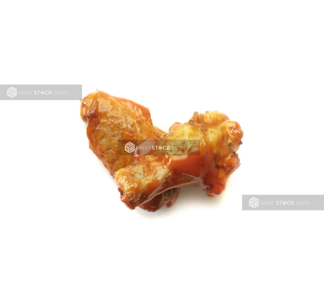 Hot sauced wings on a white background