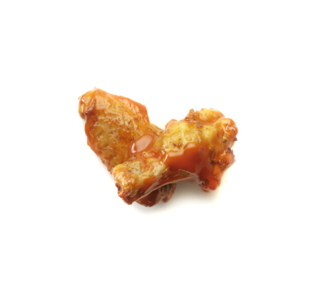 Hot sauced wings on a white background